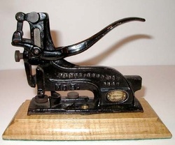 who invented the first stapler